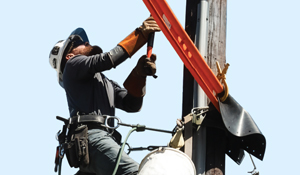 Lineman on an electrical pole
